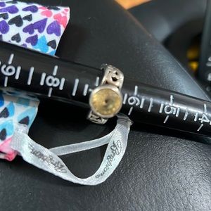 Brighton citrine color stone ring.